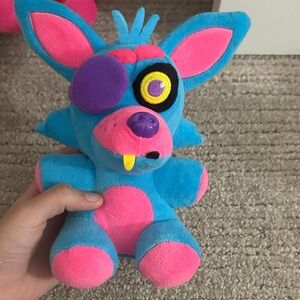 Blue and Pink Plush Toy with Eye Patch